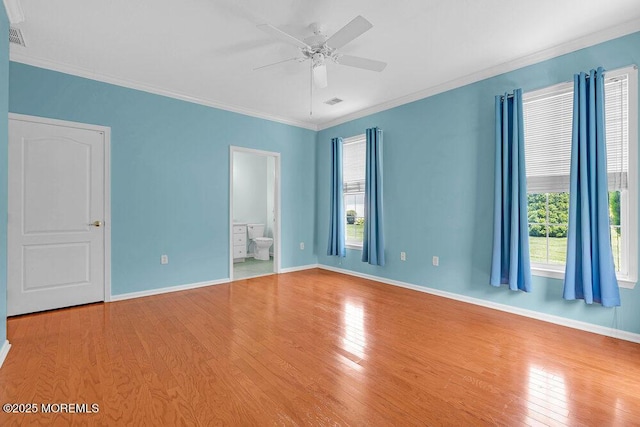 29 Goldenedge Way, Lakewood, NJ 08701 - unfurnished bedroom featuring multiple windows, ornamental molding, wood finished floors, ensuite bathroom, and a ceiling fan