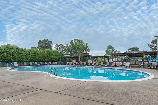 5 Bennington Dr, Toms River, NJ 08757 - community pool featuring a pergola and a patio