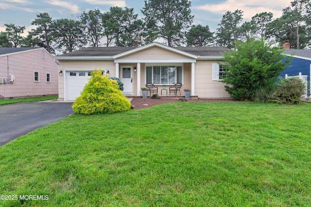 5 Bennington Dr, Toms River, NJ 08757 - single story home featuring driveway, a garage, covered porch, and a front yard