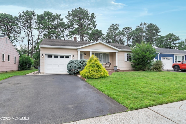 5 Bennington Dr, Toms River, NJ 08757 - ranch-style home with a garage, driveway, a porch, and a front yard