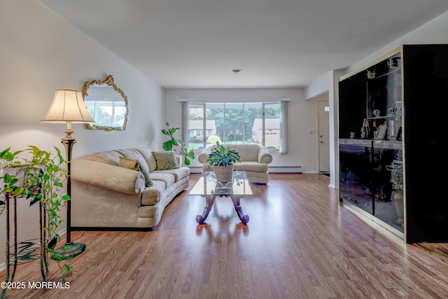 5 Bennington Dr, Toms River, NJ 08757 - living area with a baseboard radiator and wood finished floors