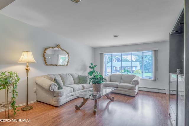 5 Bennington Dr, Toms River, NJ 08757 - living room featuring a baseboard radiator and wood finished floors