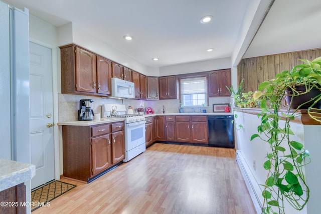 5 Bennington Dr, Toms River, NJ 08757 - kitchen featuring white appliances, light wood-style floors, light countertops, backsplash, and recessed lighting