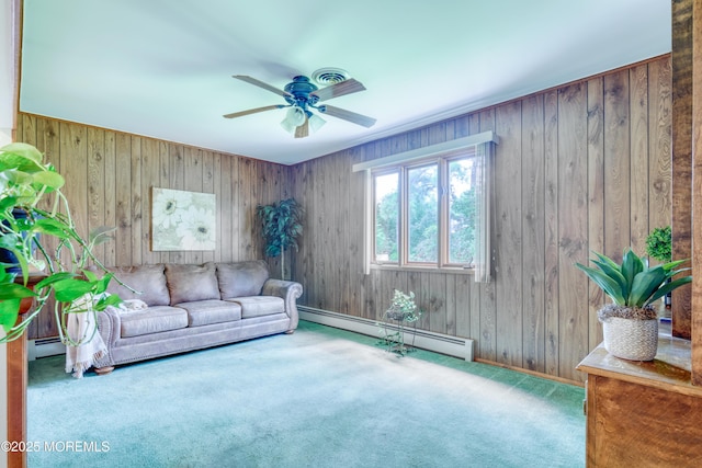 5 Bennington Dr, Toms River, NJ 08757 - carpeted living area featuring a baseboard radiator, a ceiling fan, and wood walls