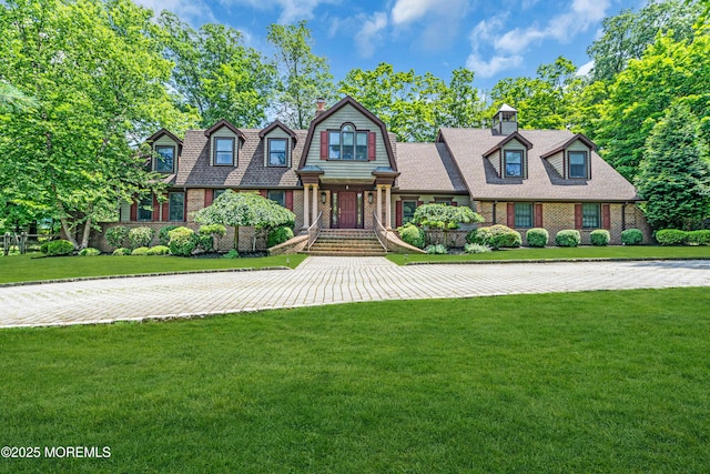 8 Old Dutch Rd, Warren, NJ 07059 - view of front facade featuring brick siding, a chimney, and a front yard