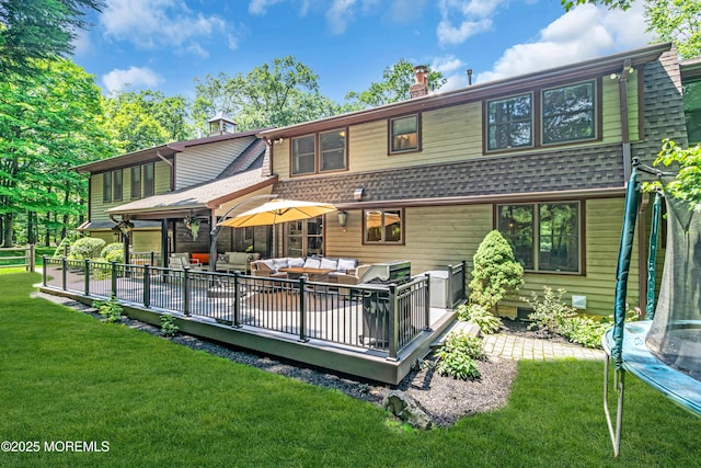 8 Old Dutch Rd, Warren, NJ 07059 - back of house featuring an outdoor hangout area, a trampoline, a chimney, a shingled roof, and a yard