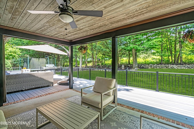 8 Old Dutch Rd, Warren, NJ 07059 - fenced backyard with an outdoor hangout area, a wooden deck, a patio area, and a ceiling fan