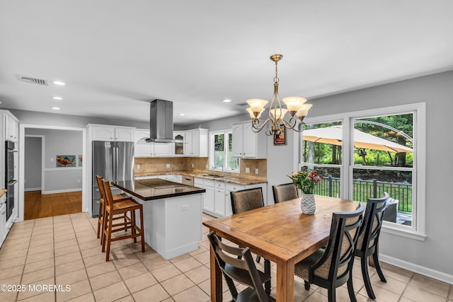8 Old Dutch Rd, Warren, NJ 07059 - dining space featuring light tile patterned floors, a chandelier, and recessed lighting