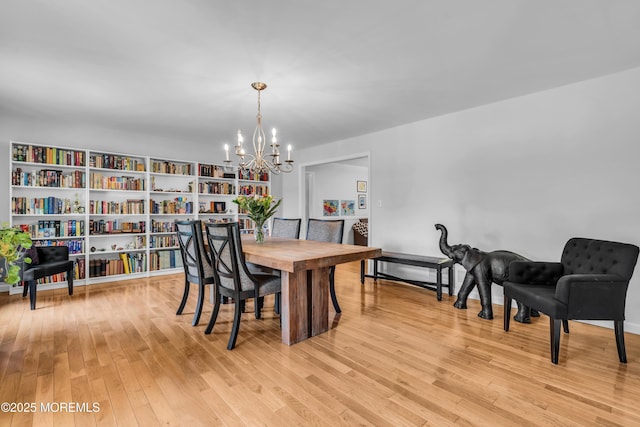 8 Old Dutch Rd, Warren, NJ 07059 - dining space with a chandelier and light wood-style floors