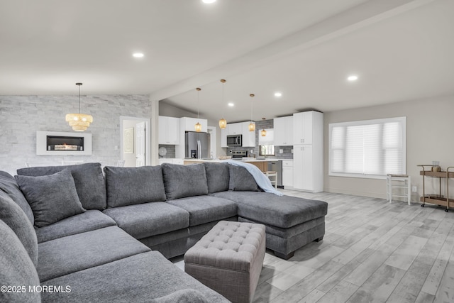 3 Casey Ct, Barnegat, NJ 08005 - living area with vaulted ceiling, light wood-type flooring, and recessed lighting
