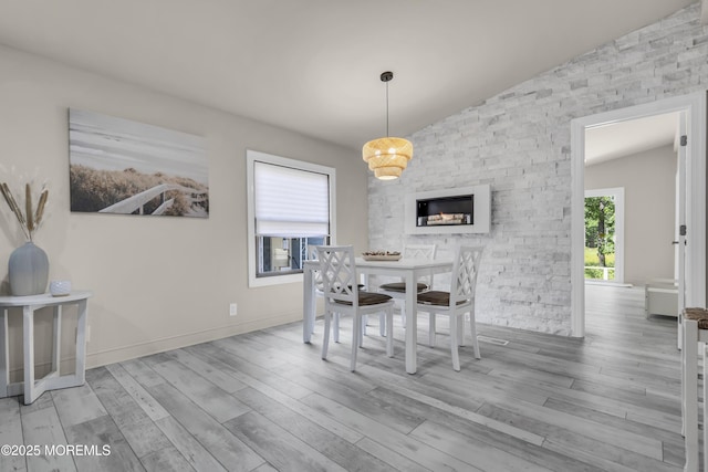 3 Casey Ct, Barnegat, NJ 08005 - dining room featuring wood finished floors, lofted ceiling, and a fireplace