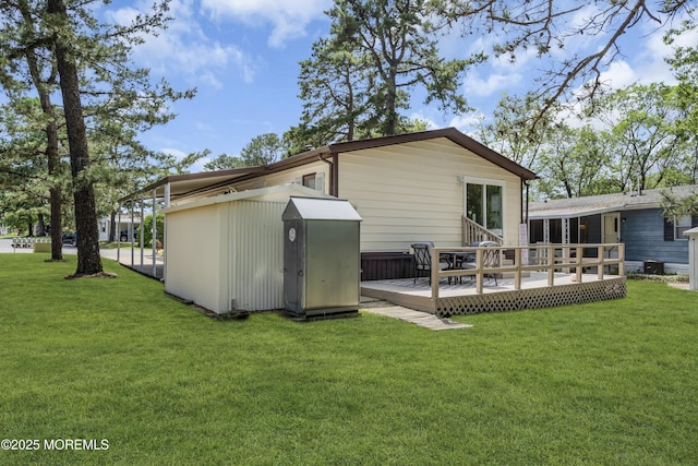3 Casey Ct, Barnegat, NJ 08005 - rear view of house featuring a storage shed, a wooden deck, and a yard