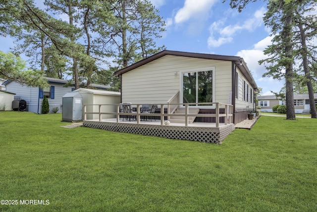 3 Casey Ct, Barnegat, NJ 08005 - back of house featuring a deck, a yard, and a storage unit