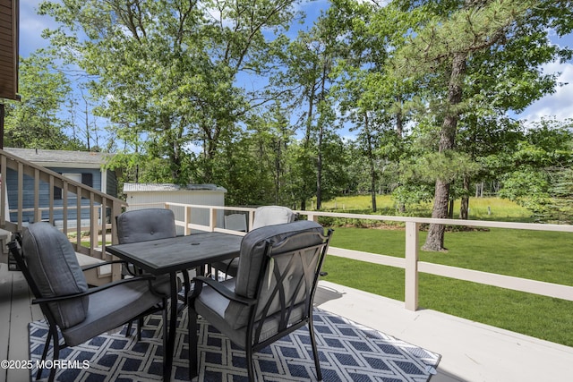 3 Casey Ct, Barnegat, NJ 08005 - wooden terrace with outdoor dining area, a yard, and view of scattered trees