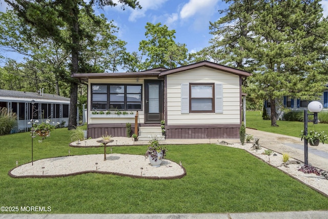 3 Casey Ct, Barnegat, NJ 08005 - manufactured / mobile home with a front yard and covered porch