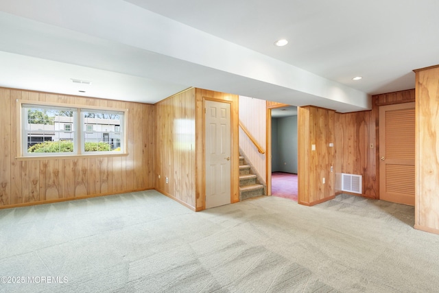 235 Long Branch Ave, Bayville, NJ 08721 - carpeted empty room featuring stairway, wooden walls, and recessed lighting