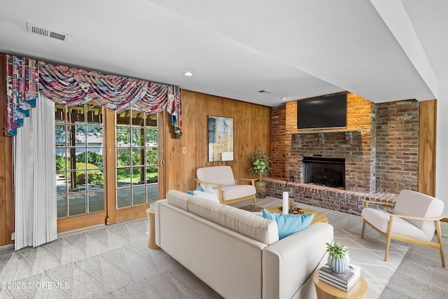 235 Long Branch Ave, Bayville, NJ 08721 - living area featuring wooden walls, a brick fireplace, and recessed lighting