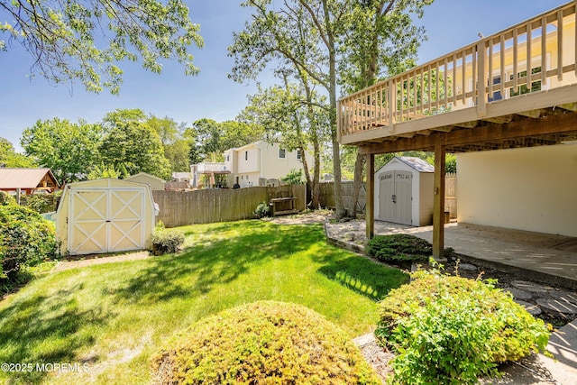 235 Long Branch Ave, Bayville, NJ 08721 - fenced backyard with a storage unit and a deck