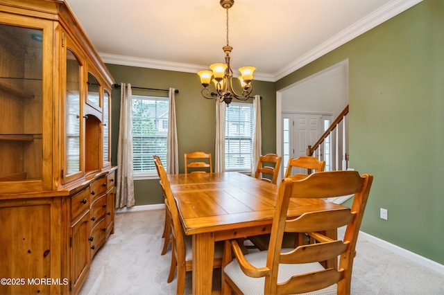 96 Bridle Path, Bayville, NJ 08721 - dining space featuring a chandelier, light carpet, and crown molding