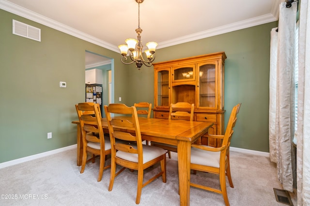 96 Bridle Path, Bayville, NJ 08721 - dining area featuring a chandelier, crown molding, and light colored carpet