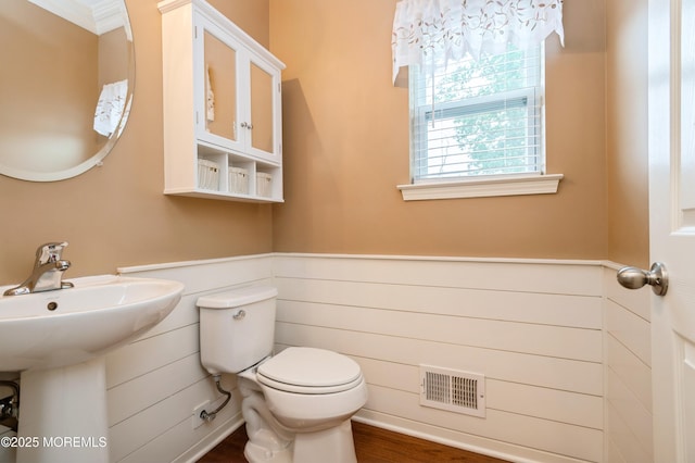 96 Bridle Path, Bayville, NJ 08721 - half bath with wainscoting, wood finished floors, and crown molding