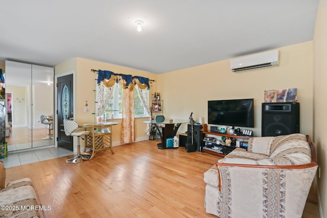 131 W 3rd St, Howell, NJ 07731 - living room featuring an AC wall unit and wood finished floors