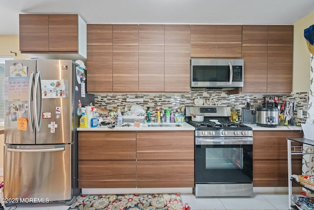 131 W 3rd St, Howell, NJ 07731 - kitchen with stainless steel appliances, modern cabinets, and light countertops