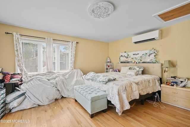 131 W 3rd St, Howell, NJ 07731 - bedroom featuring a wall mounted AC, wood finished floors, and attic access