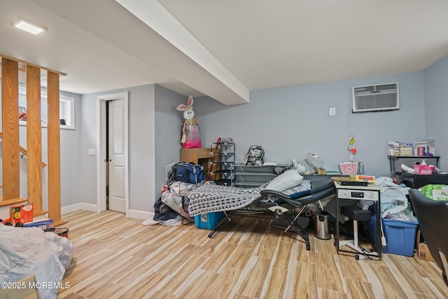 131 W 3rd St, Howell, NJ 07731 - living area featuring wood finished floors and a wall mounted AC