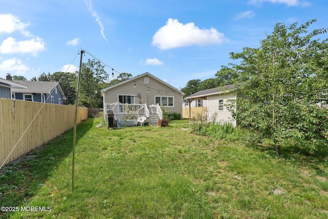 131 W 3rd St, Howell, NJ 07731 - rear view of house with a wooden deck