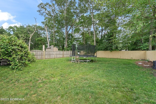 131 W 3rd St, Howell, NJ 07731 - fenced backyard with a trampoline