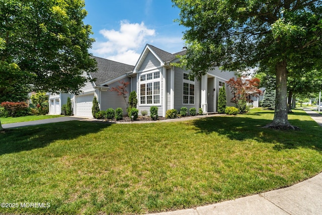 57 Mirage Blvd, Barnegat, NJ 08005 - view of front of home featuring a front yard, a garage, and driveway