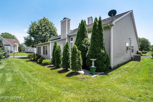 57 Mirage Blvd, Barnegat, NJ 08005 - view of side of property featuring a chimney and a lawn