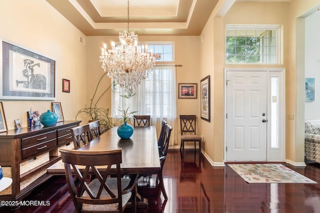 57 Mirage Blvd, Barnegat, NJ 08005 - dining space featuring dark wood-type flooring, a towering ceiling, healthy amount of natural light, and a chandelier