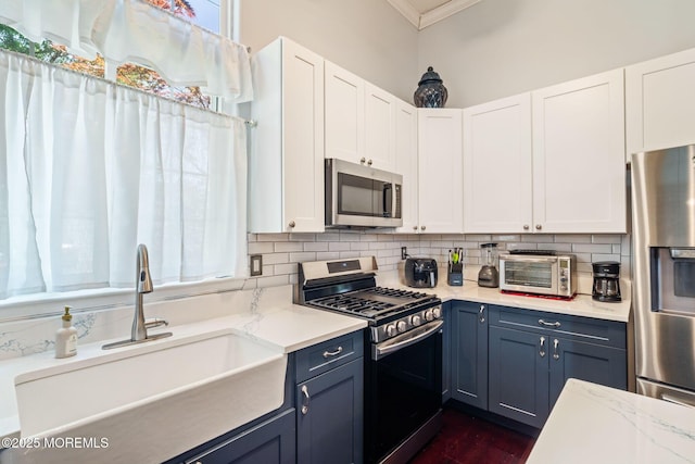 57 Mirage Blvd, Barnegat, NJ 08005 - kitchen featuring appliances with stainless steel finishes, crown molding, decorative backsplash, and white cabinets
