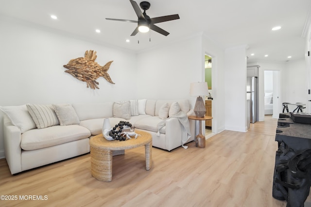 401 Broadway Unit 21A, Barnegat Light, NJ 08006 - living area with ceiling fan, light wood-style floors, recessed lighting, and crown molding