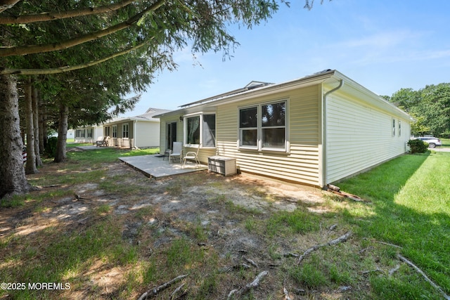 188 Lions Head Blvd S, Brick, NJ 08723 - rear view of house with a patio area and a lawn