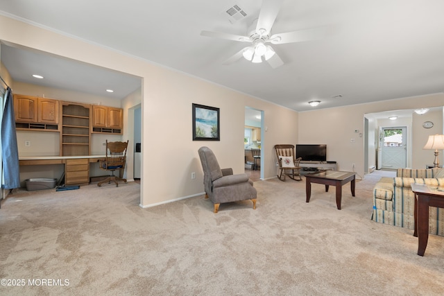 188 Lions Head Blvd S, Brick, NJ 08723 - living area featuring built in study area, light carpet, a ceiling fan, and crown molding