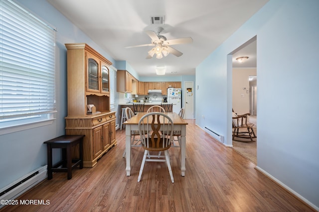 188 Lions Head Blvd S, Brick, NJ 08723 - dining room featuring ceiling fan, light wood finished floors, and baseboard heating