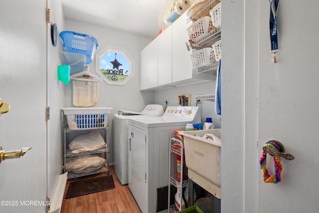 188 Lions Head Blvd S, Brick, NJ 08723 - washroom with washing machine and clothes dryer, cabinet space, and light wood-style floors