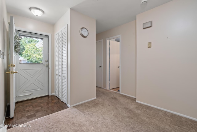 188 Lions Head Blvd S, Brick, NJ 08723 - foyer entrance with baseboards and dark colored carpet