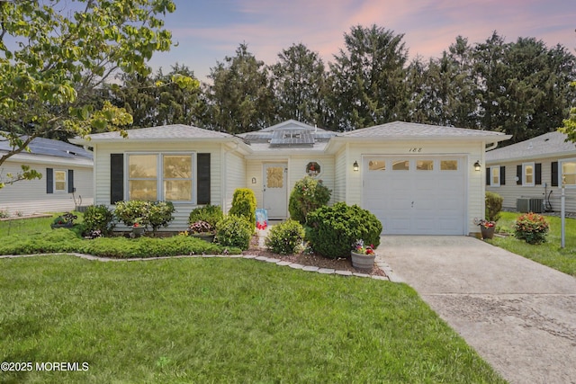 188 Lions Head Blvd S, Brick, NJ 08723 - ranch-style house featuring a garage, concrete driveway, and a yard