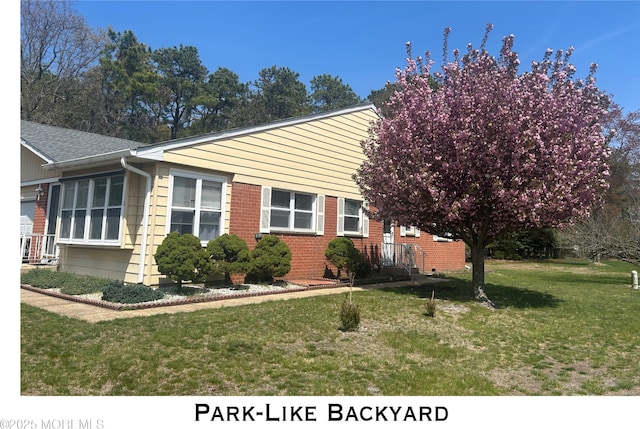 1-B Pilgrim Ct, Whiting, NJ 08759 - view of front of house featuring a front yard and brick siding