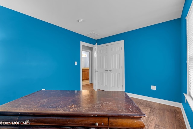7 Holly Tree Ct, Jackson, NJ 08527 - unfurnished bedroom featuring wood finished floors and a closet