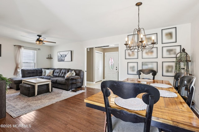 98 Washington St, Keyport, NJ 07735 - dining area with a chandelier, wood-type flooring, and a ceiling fan