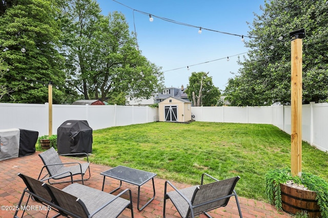 98 Washington St, Keyport, NJ 07735 - fenced backyard with a shed and a patio area