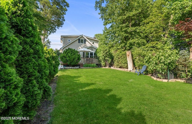 517 Laurel Ave, West Allenhurst, NJ 07711 - view of green lawn featuring a wooden deck