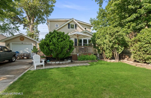 517 Laurel Ave, West Allenhurst, NJ 07711 - view of front of home with a front yard, an outdoor structure, a wooden deck, and driveway