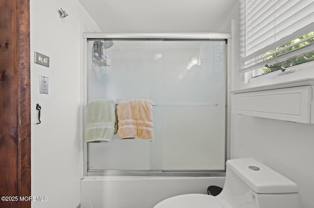 517 Laurel Ave, West Allenhurst, NJ 07711 - full bath featuring toilet and shower / bath combination with glass door