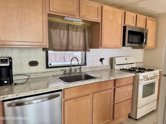 1408 Anvil Way, Toms River, NJ 08755 - kitchen featuring appliances with stainless steel finishes, decorative backsplash, light brown cabinetry, and light tile patterned flooring